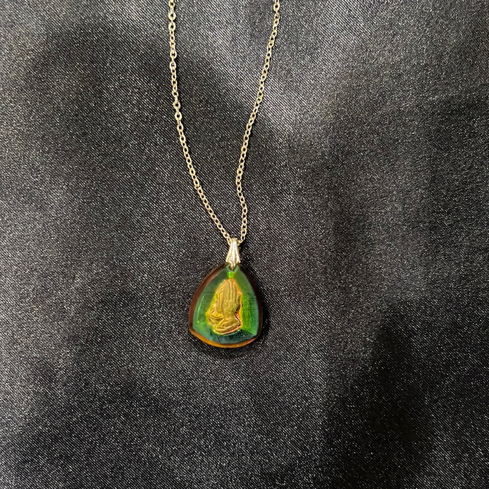 Praying hands necklace